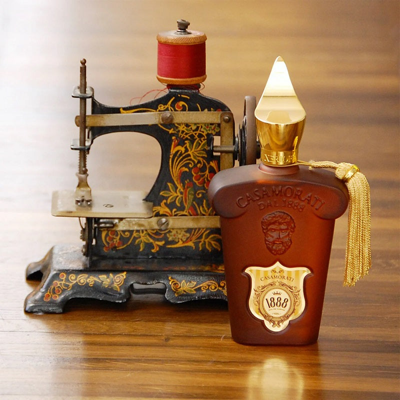 Vintage Sewing Machine paired with a bottle.