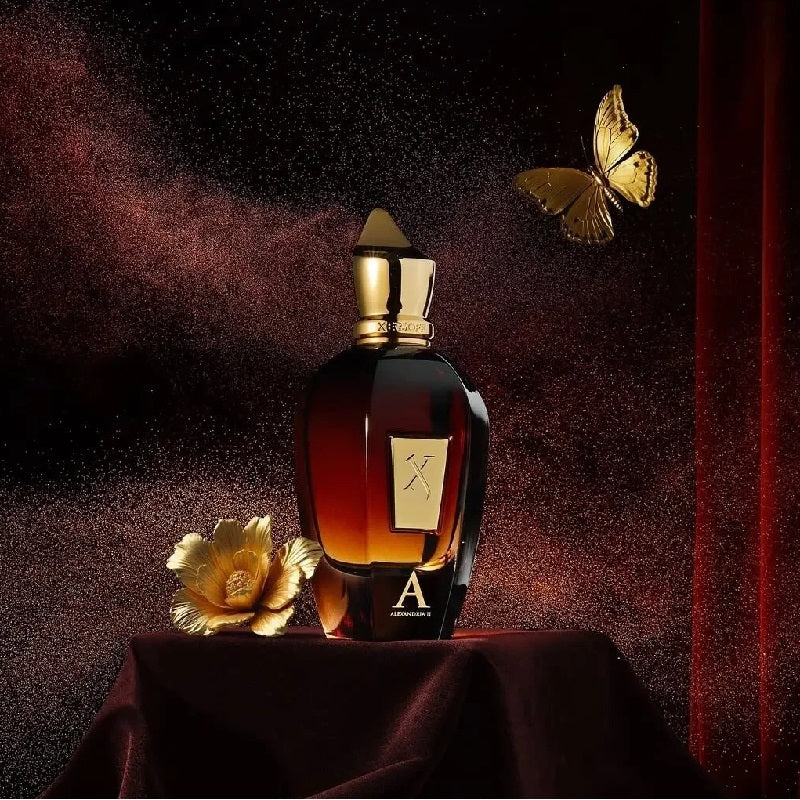 Luxury perfume bottle with gold accents on a dark background