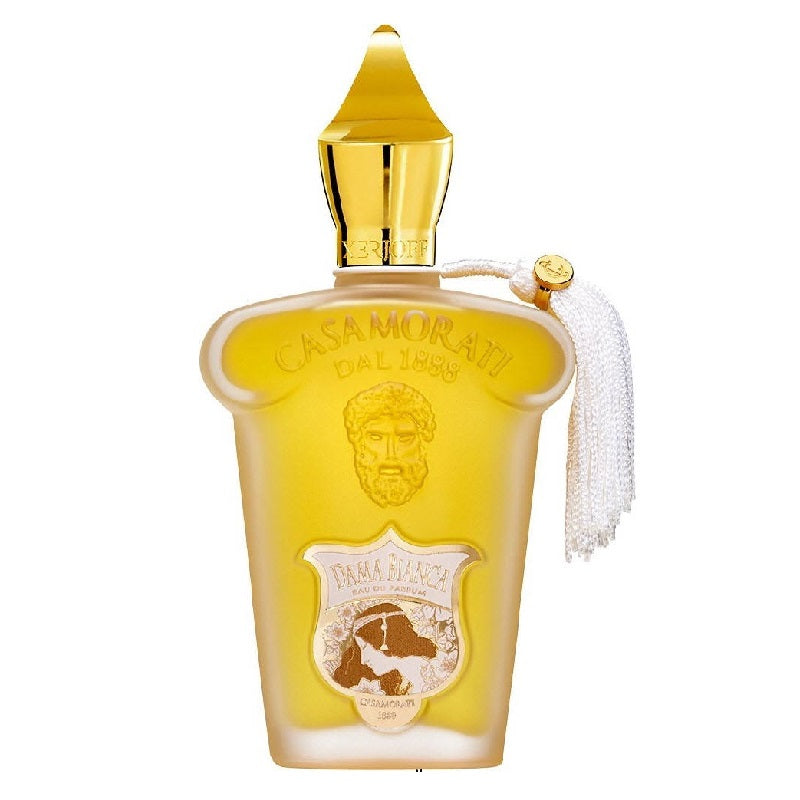 A bottle of Casamora Di Luca Amarillo Amarillo Scuro liqueur, featuring a frosted yellow glass body, a shiny gold cap, and a white tassel, set against a plain white background.