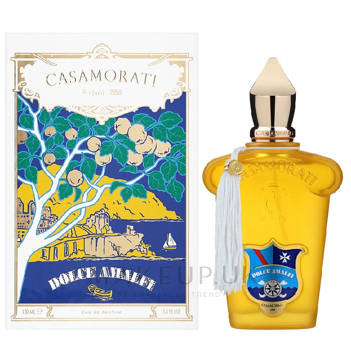 The product image shows two views of a perfume bottle. On the left is the packaging with a colorful illustration of a Mediterranean scene, and on the right is the perfume bottle itself with a yellow liquid inside.