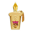 A gold-colored bottle of Casamorati Fiore D'ulivo eau de parfum with a decorative label and a tassel on the cap.