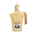 A glass bottle of Casamorati Fiore D'ulivo Eau de Parfum by Xerjoff, featuring a gold label and a tassel on the cap.