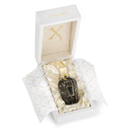Perfume bottle in a decorative box with 'Xerjoff' branding on a white background