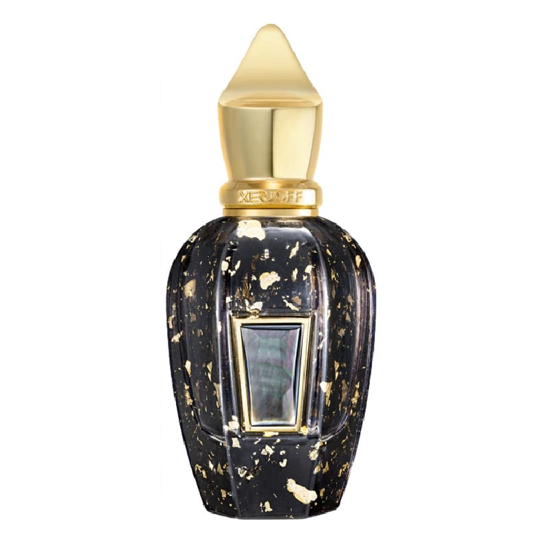 Perfume bottle with gold cap and black and gold speckled body on a white background
