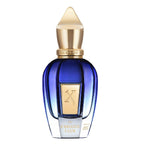 Blue perfume bottle with gold cap on a white background