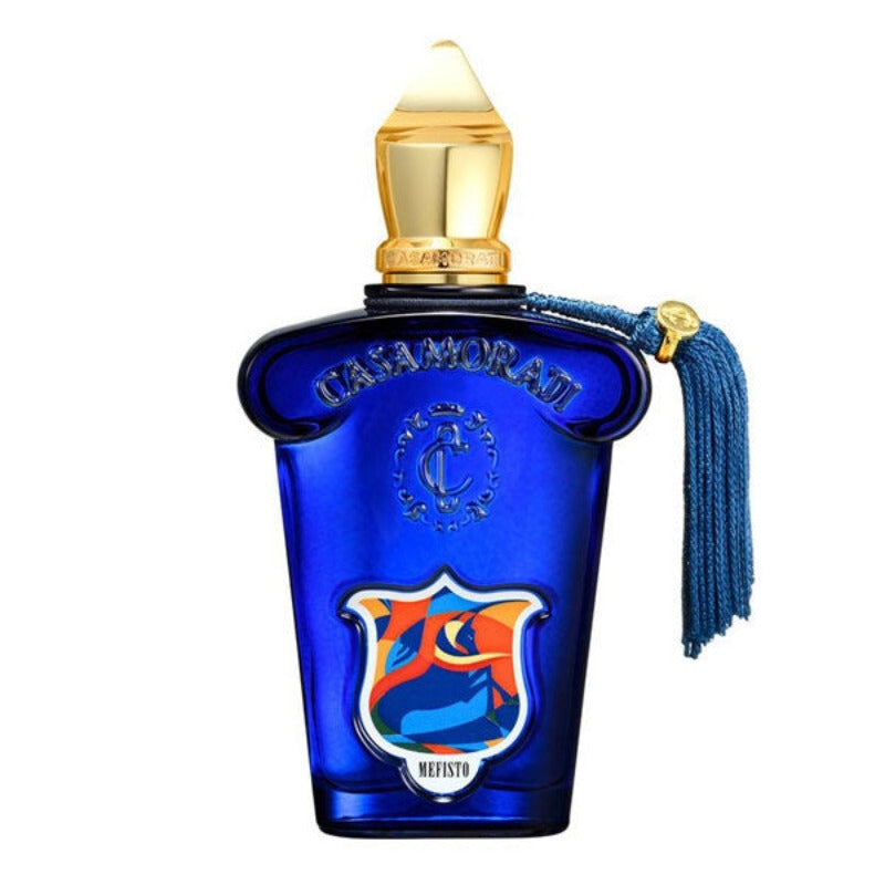 A blue glass bottle of Casamorati Mefisto Eau de Parfum by Xerjoff, featuring a gold cap and a label with white, blue, and red colors.