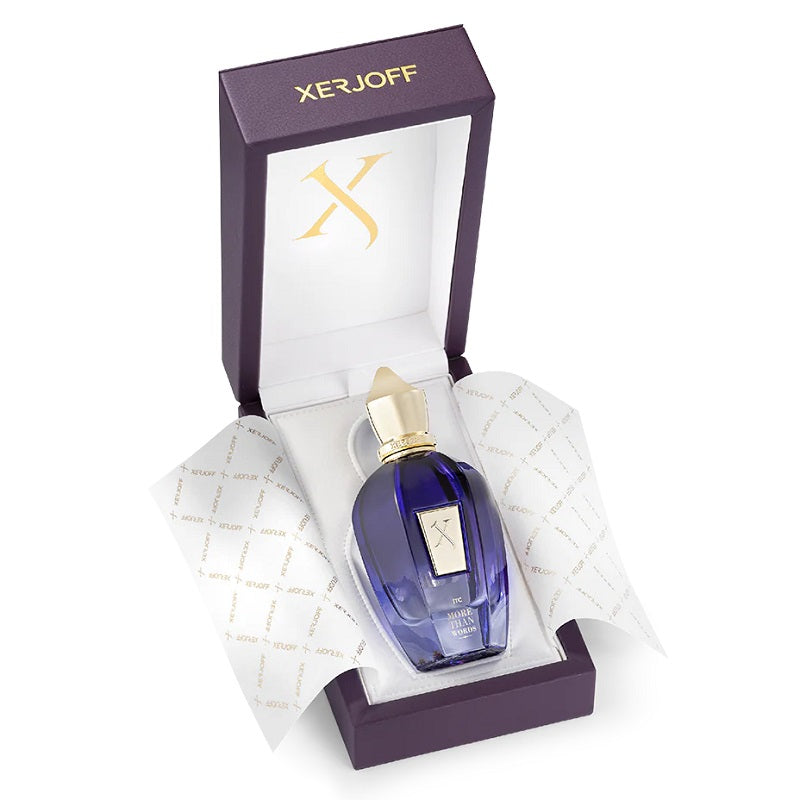 Perfume bottle with gold cap in a Xerjoff box on a white background