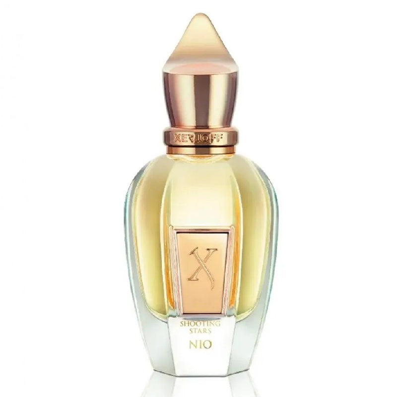 Perfume bottle with gold cap and clear body on a white background