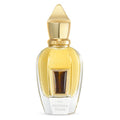 Perfume bottle with gold cap and clear body on a white background
