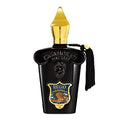 Black Casamorati Regio bottle with gold cap on a white background
