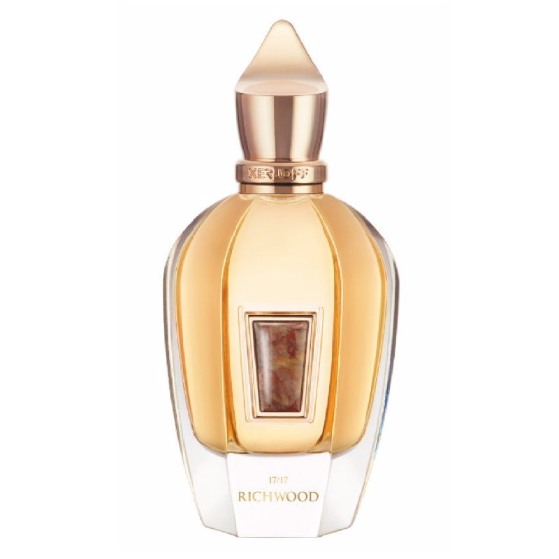 Perfume bottle with gold cap and clear body on a white background