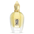 Perfume bottle with gold cap and decorative label on a white background