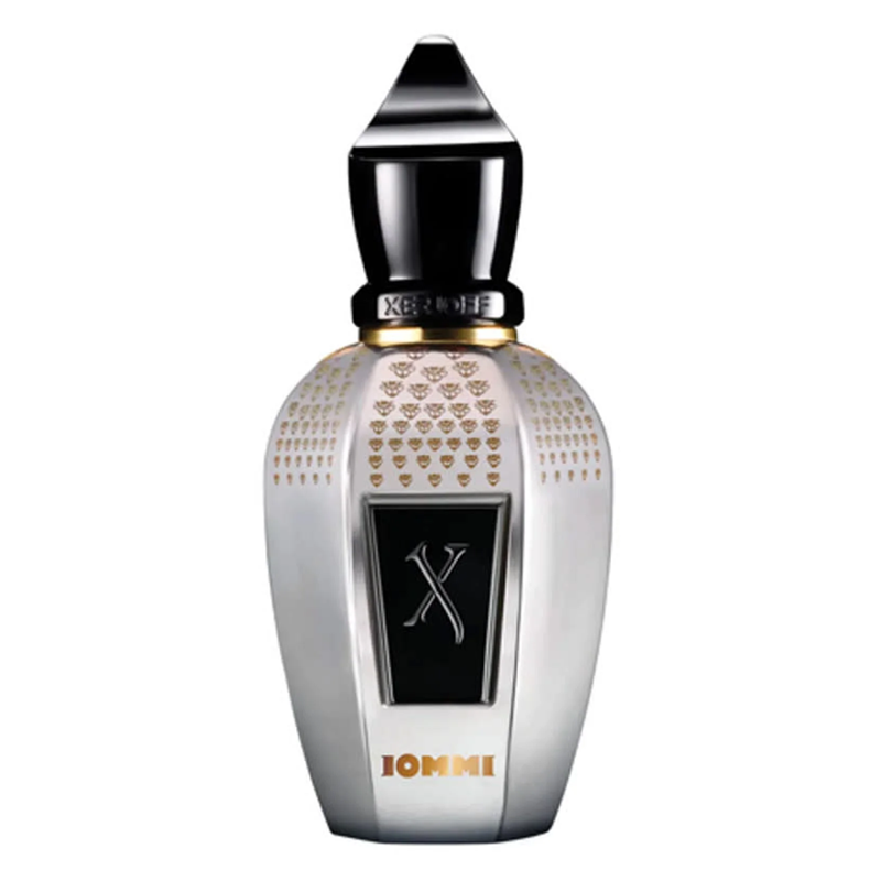 A luxury perfume bottle with a metallic silver body, gold heart-patterned accents, a black central label with a stylized 'X', and a glossy black cap, shown on a plain white background.
