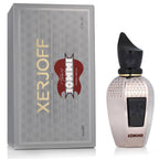 Xerjoff for Tomi IOMMI cologne 50ml bottle next to its silver packaging box on a white background.