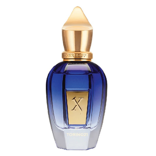 Perfume bottle with blue glass and gold cap on a white background