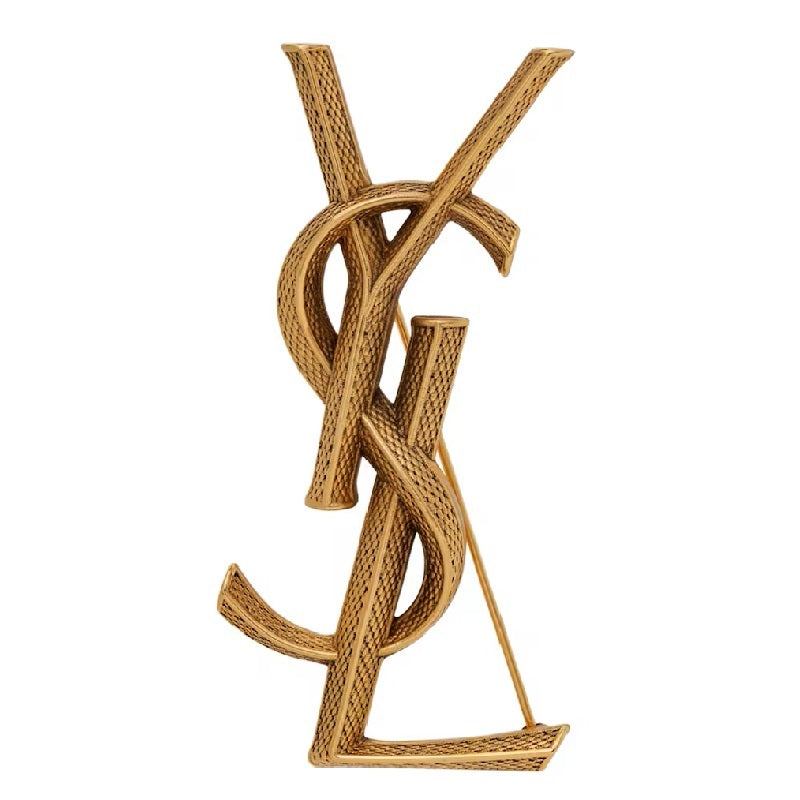 Gold logo with intertwined design on a white background