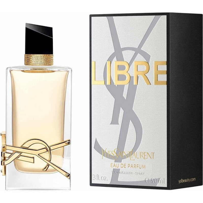 Libre Eau De Parfum by Yves Saint Laurent in a clear bottle with a gold cap, alongside its packaging box with the brand's logo.
