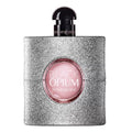 YSL Black Opium perfume bottle with silver glittery design on a white background