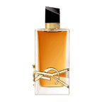 A glass bottle of Libre Intense Eau de Parfum by Yves Saint Laurent with a gold cap and a decorative gold band around the middle.
