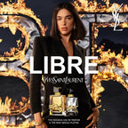 YSL Libre perfume advertisement with a model holding two perfume bottles against a fiery background.