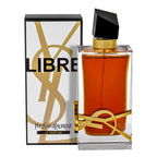 A bottle of Libre Le Parfum by Yves Saint Laurent with the corresponding perfume box, displaying a clear amber-colored liquid.