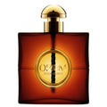 A square-shaped brown perfume bottle with a gold cap, labeled 'Opium' by Yves Saint Laurent.