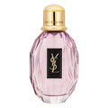 YSL perfume bottle with gold cap on a white background