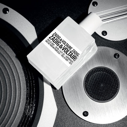 This is Her! 100 ml Eau de Parfum by Zadig & Voltaire – styled in a chic urban setting symbolising freedom, self-expression, and modern femininity.