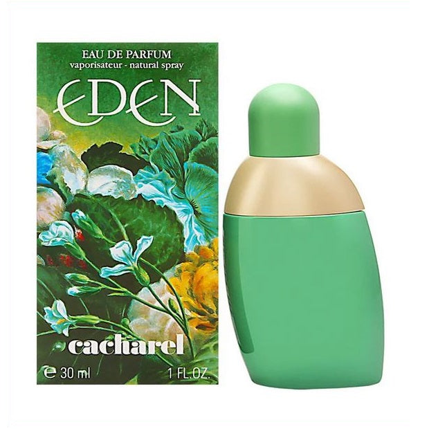 A product image featuring a green bottle of 'Eden' Eau de Parfum by Cacharel, with a floral design on the packaging. The bottle is accompanied by its box, both displaying vibrant colors and floral graphics.