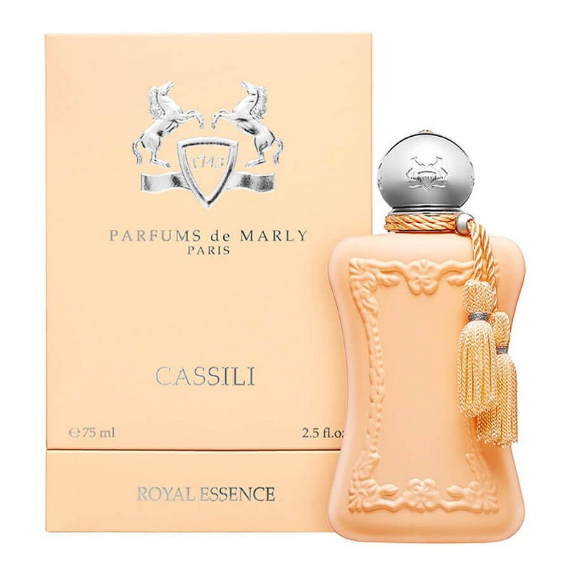A product image featuring Cassili Eau de Parfum by Parfums De Marly. The image shows the perfume bottle and packaging, with the bottle displaying a peach-colored liquid.
