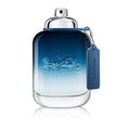 A glass bottle of Coach Blue Men Eau de Toilette with a blue to clear gradient and a silver cap, featuring an embossed design of a horse and carriage.