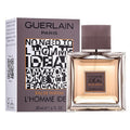 A bottle of Guerlain L'Homme Ideal Eau de Parfum next to its packaging box.