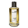 A glass bottle of Mancera Cedrat Boise Intense Eau de Parfum with a black cap and a yellow-tinted perfume visible inside.