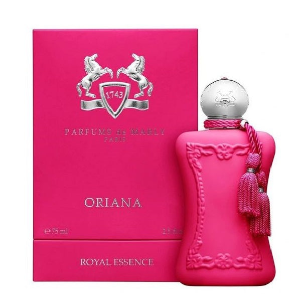 A pink bottle of Oriana eau de parfum by Parfums De Marly with a matching pink box, both featuring a white unicorn and horse logo.