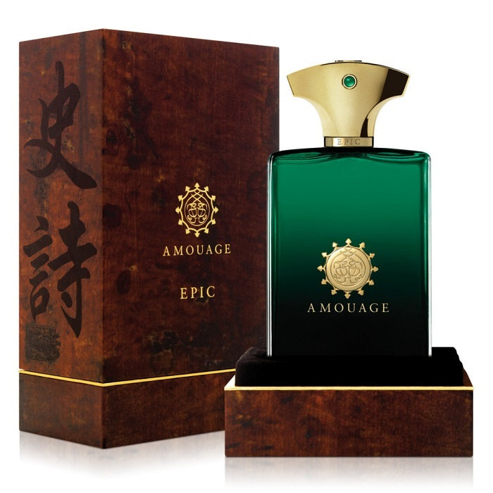 A product image featuring a green colored Eau De Parfum bottle with a gold cap, alongside its packaging box with Chinese characters and the brand name 'Amouage' inscribed.
