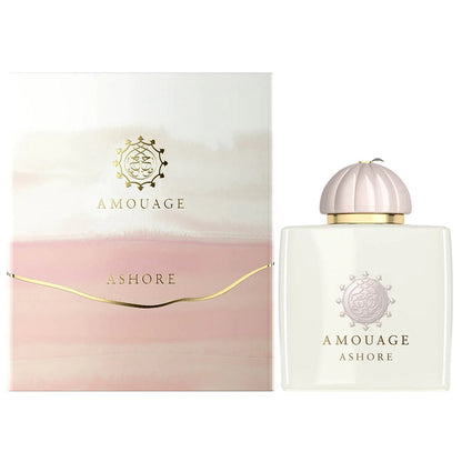 Amouage Ashore perfume bottle and packaging – luxurious design evoking seaside warmth and light.
