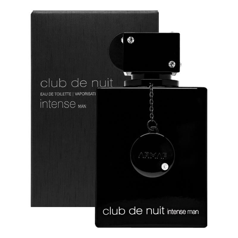 A black bottle of Club de Nuit Intense Man Eau de Toilette by Armaf, with a matching black box. The bottle cap is open, and a crystal-like piece is attached to the cap with a black string.