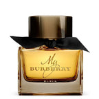 A bottle of My Burberry Black eau de parfum with a clear glass design and a black cap, adorned with a black bow.
