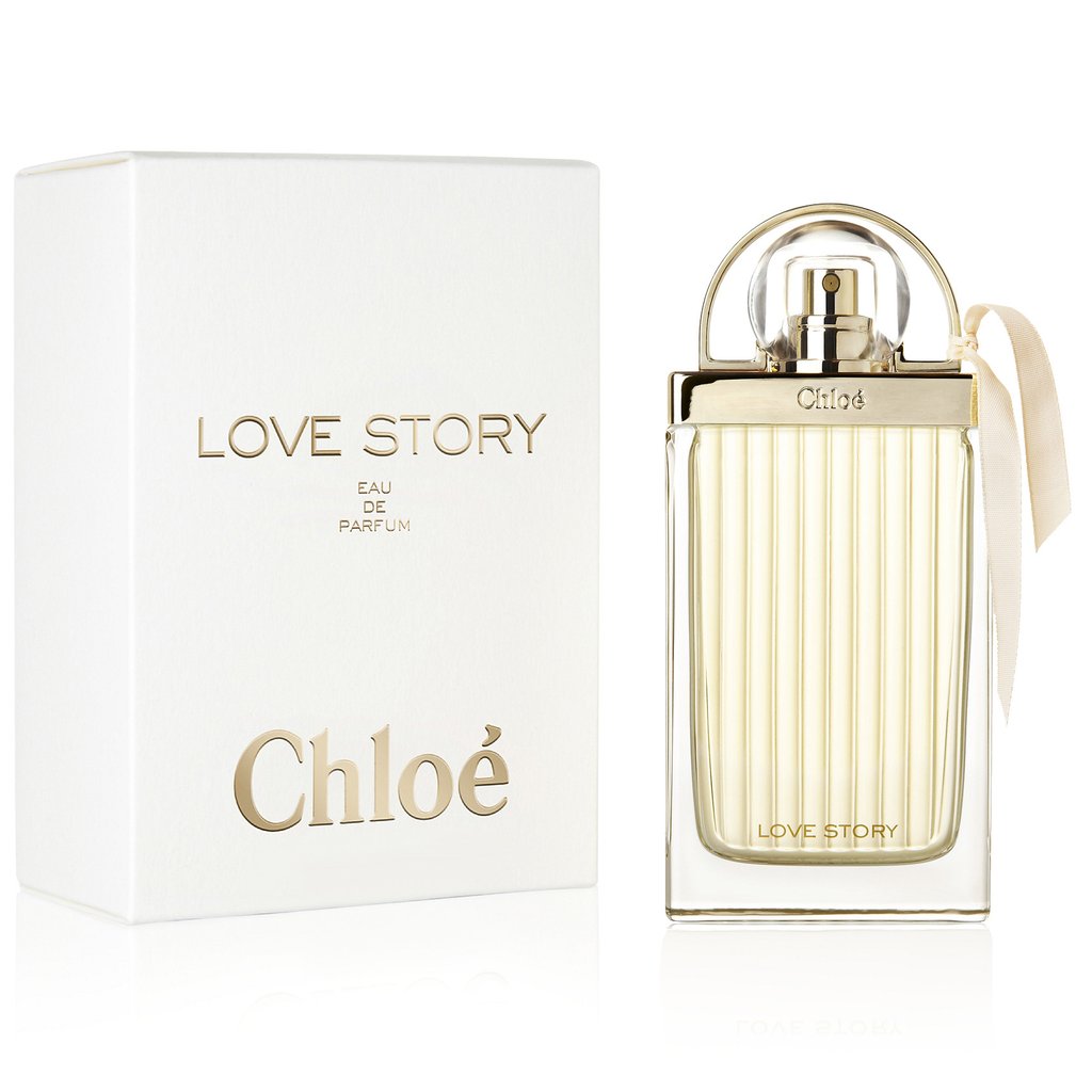 Chloe Love Story Eau de Parfum bottle with packaging, predominantly white with gold accents on the bottle and a white ribbon bow on the box.