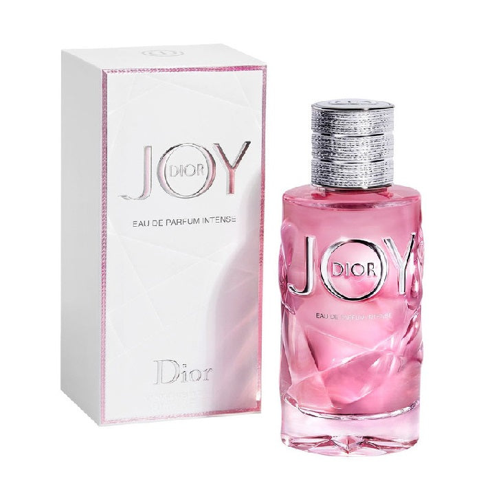 A product image showing a pink bottle of Dior Joy Intense Eau de Parfum with its corresponding white box.