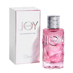 A product image showing a pink bottle of Dior Joy Intense Eau de Parfum with its corresponding white box.