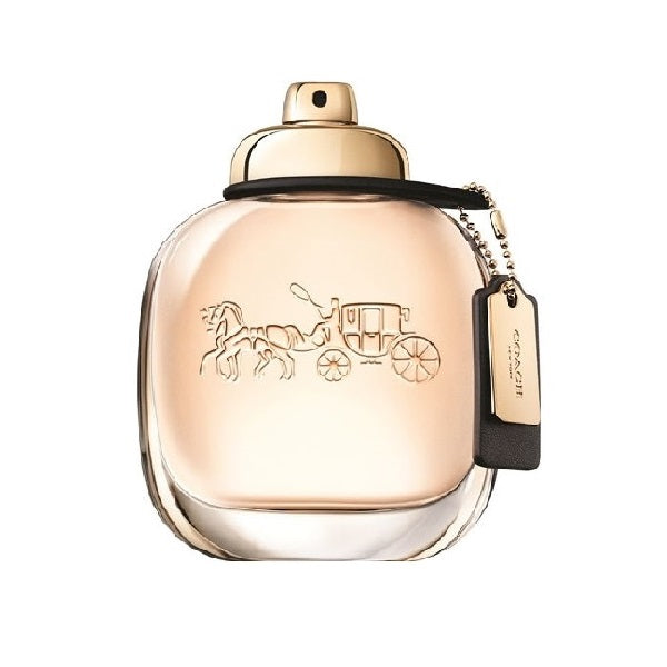 A bottle of Coach the Fragrance Eau de Parfum with a clear, golden-hued design featuring a horse and carriage motif.