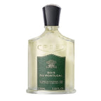 A bottle of Creed Bois du Portugal eau de parfum with a green label, white liquid, and a black cap.