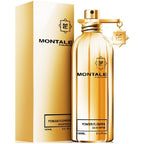 A gold-colored, transparent perfume bottle with a white label that reads 'Montale', alongside a gold box with the same branding.