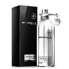 A bottle of Soleil de Capri Eau de Parfum by Montale, with a black box in the background. The bottle is clear with a silver label and the cap is metallic.