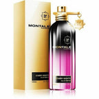 A bottle of Montale Starry Night Eau de Parfum with a gold and black label, next to its packaging box.