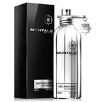 A 100ml bottle of Montale Sweet Oriental Dream Eau de Parfum, with a black box packaging. The bottle is transparent, showcasing the white liquid inside, and has a metallic cap.