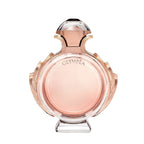 A glass bottle of Olympea Eau de Parfum by Paco Rabanne with a pink and gold label, the bottle is filled with a pink liquid.