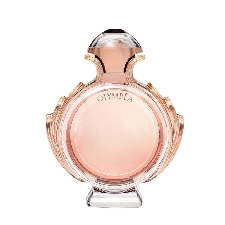 A glass bottle of Olympea Eau de Parfum by Paco Rabanne with a pink and amber liquid visible, along with a crystal-like cap.