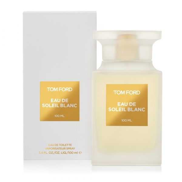 A Tom Ford Eau de Toilette spray bottle labeled 'SOLEIL BLANC' with a capacity of 100ml, alongside its packaging box.